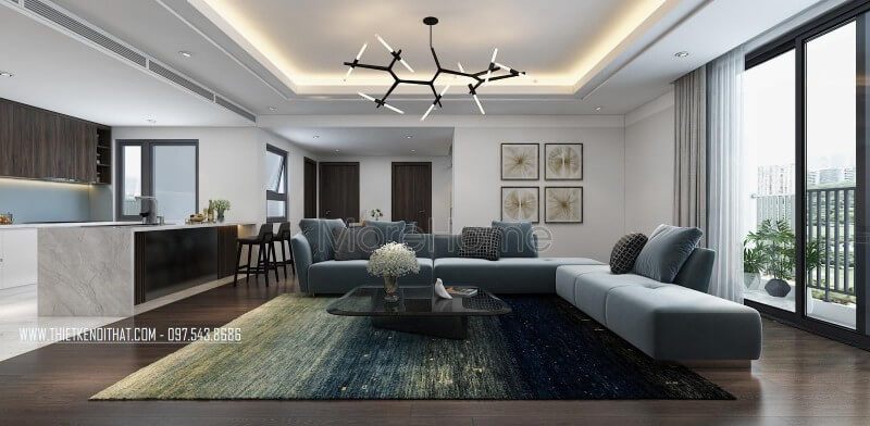 Chiếc sofa nỉ chữ L màu xanh là điểm nhấn nổi bật của căn phòng, đặc biệt gam màu này tạo sự mới lạ cho căn phòng